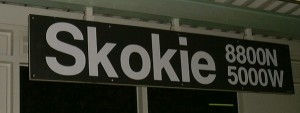 Moving Boxkes Skokie Train Sign